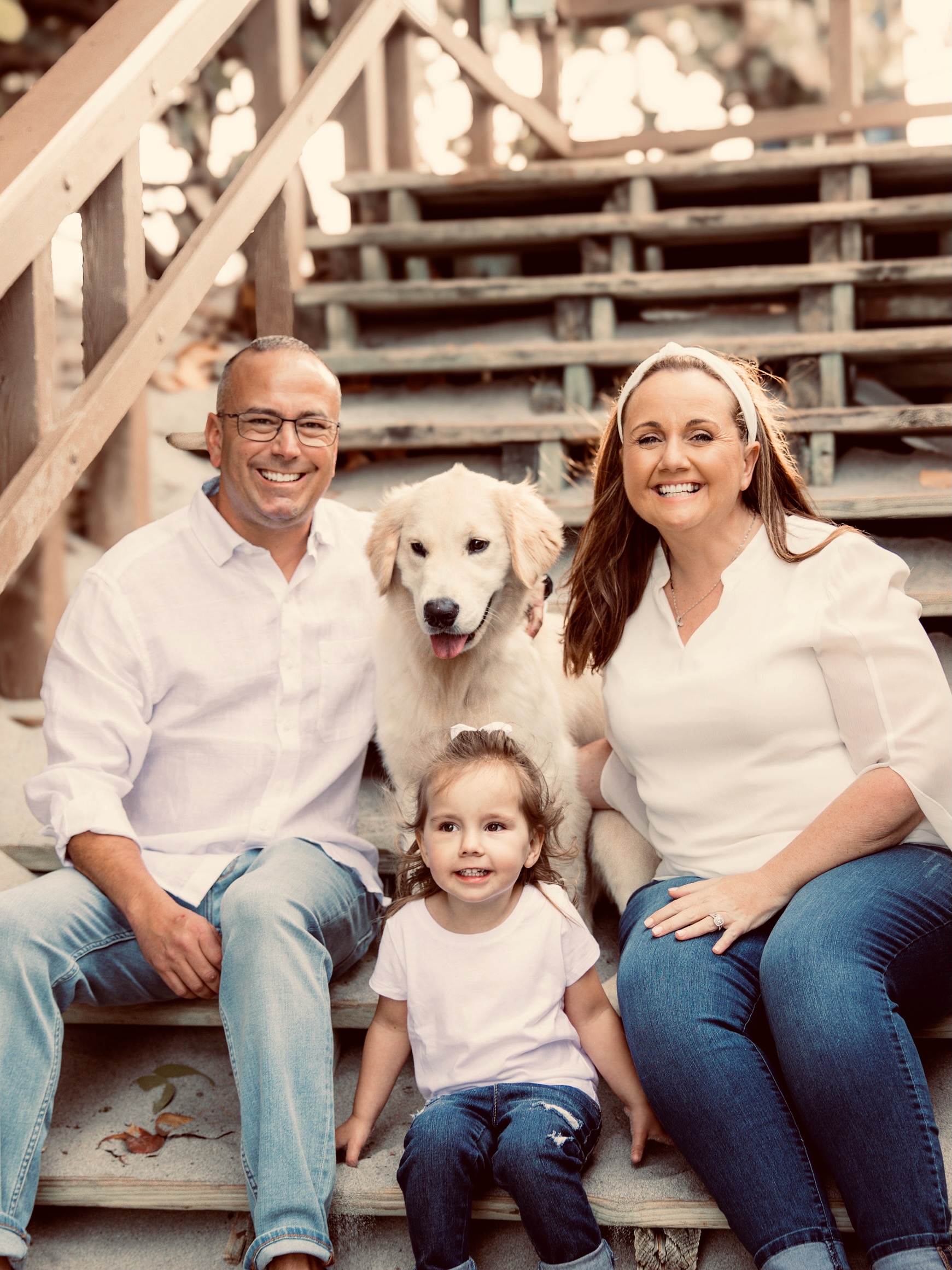 Jason Stern with his wife, daughter, and dog